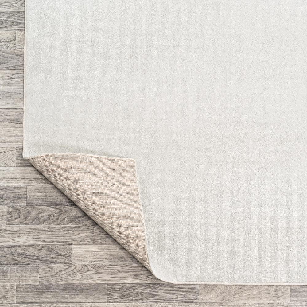 Cream 4' x 6' Synthetic Washable Rectangular Area Rug