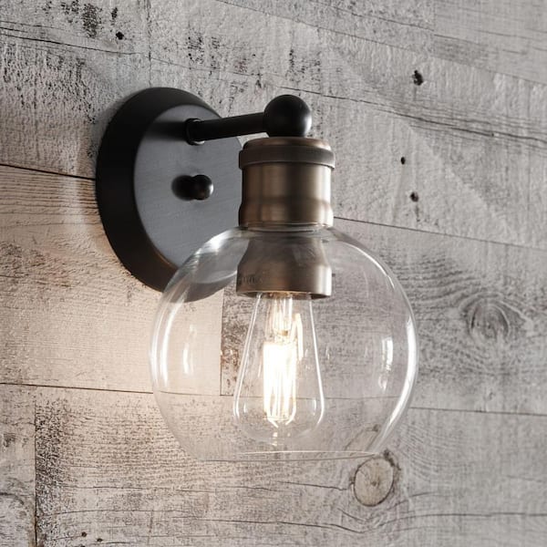 Hansford Collection 1-Light Antique Bronze Clear Glass Coastal Farmhouse Bathroom Vanity Wall Light
