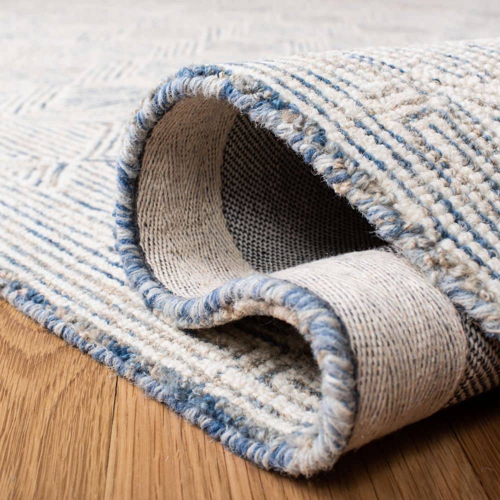 Blue and Ivory Handmade Wool 9' x 12' Geometric Area Rug