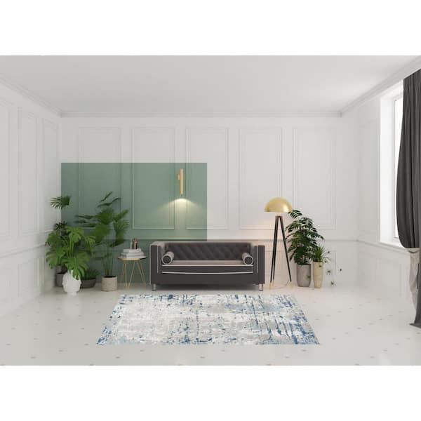 6' X 9' Ivory Abstract Power Loom Area Rug