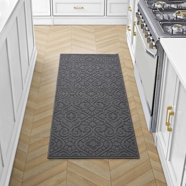 Feya Solid Dark Gray 2 ft. x 5 ft. Tufted Medallion Polypropylene Runner Rug