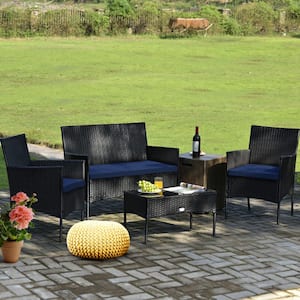 4-Piece Patio Metal Rattan Conversation Set with Tempered Glass Top Coffee Table & Seat Cushions in Navy