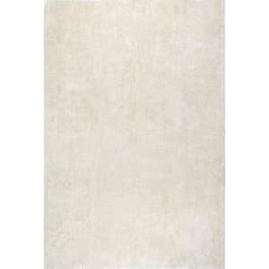 Loni Solid Machine Washable Shag Cream 8 ft. x 10 ft. Area Rug