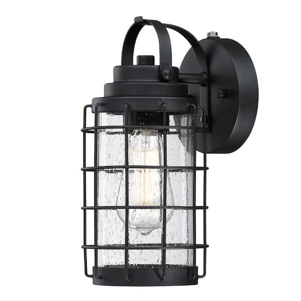 Westinghouse Jupiter Point 1-Light Textured Black Finish Outdoor Wall Mount Lantern with Clear Seeded Glass, Dusk to Dawn Sensor