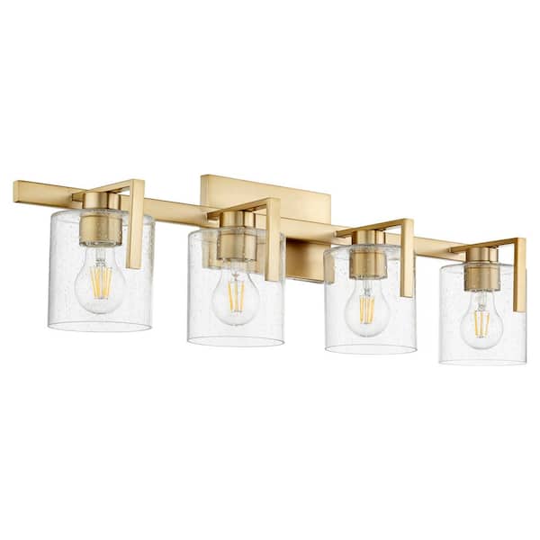 Quorum International 4-Light - 100-Watt Medium Base Lamp Light Vanity 30 in. Width with 4 Clear Seeded Glasses Aged Brass