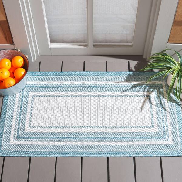 Courtyard 2 x 4 Ivory/Aqua Border Area Rug