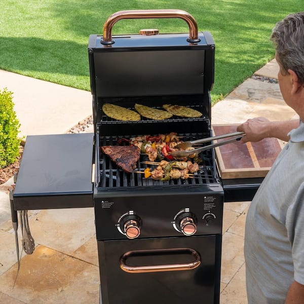 2-Burner Compact Gas Grill with Foldable Side Tables in Black with Copper Accent