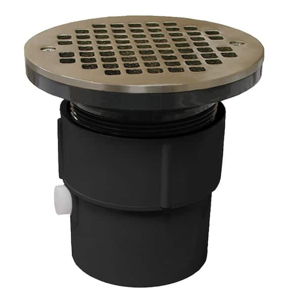 JONES STEPHENS 3 in. x 4 in. PVC Pipe Fit Drain Base with 3-1/2 in. IPS Plastic Spud and 6 in. Round Nickel Bronze Strainer