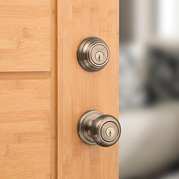 Kwikset Juno Antique Brass Exterior Entry Door Knob and Single Cylinder  Deadbolt Combo Pack Featuring SmartKey Security 991J SMT CP The Home  Depot