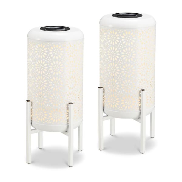 Glitzhome 14.25 in. H White Metal Cutout Flower Pattern Solar Powered LED Outdoor Lantern with Stand (set of 2)