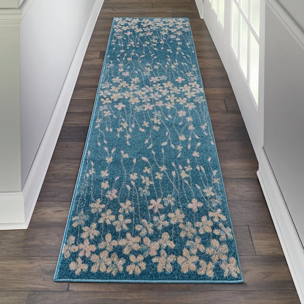 https://images.thdstatic.com/productImages/8e402bb4-1cbd-44b4-b2d4-fe16f3b16bba/svn/turquoise-nourison-area-rugs-485823-e1_600.jpg