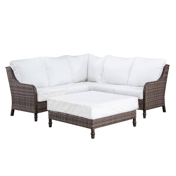 Hampton Bay Windsor 4-Piece Brown Wicker Outdoor Patio Sectional Sofa with Ottoman and Sunbrella Beige Tan Cushions