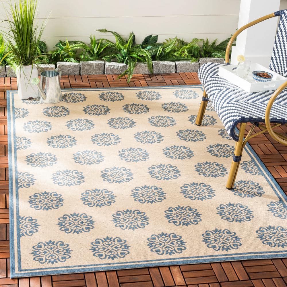 Blue and Creme Geometric Synthetic Indoor/Outdoor Rug 48" x 26"