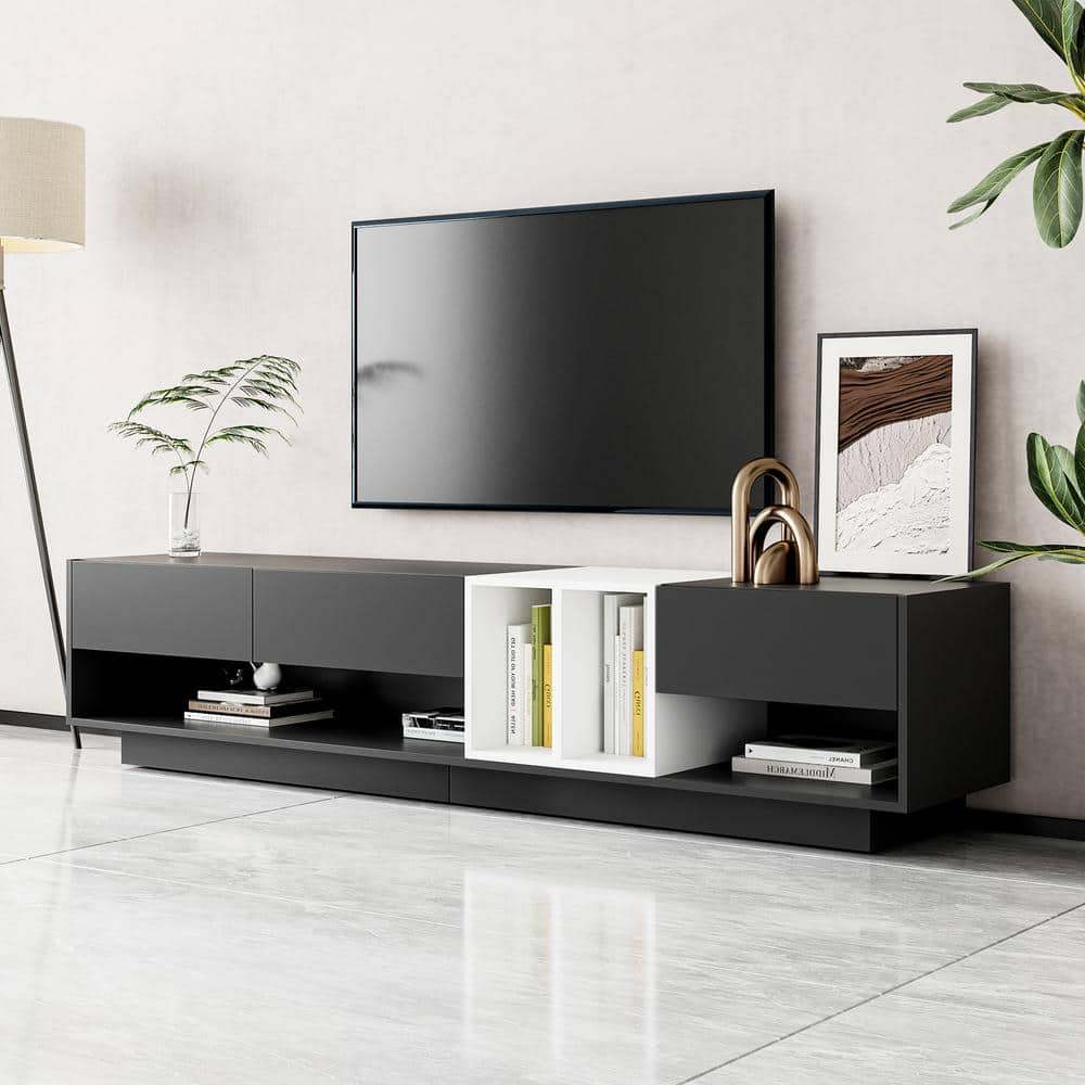 https://images.thdstatic.com/productImages/8e9aac41-1378-4a5a-b574-16d5b5fc5681/svn/black-and-white-magic-home-tv-stands-cs-mf189201naa-64_1000.jpg