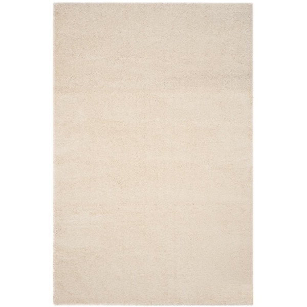 SAFAVIEH Santa Monica Shag Ivory 7 ft. x 10 ft. Solid Area Rug SGN725 ...