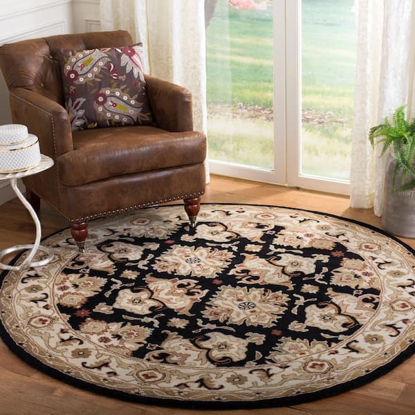 Heritage Black/Ivory 5 ft. x 7 ft. Oval Border Area Rug