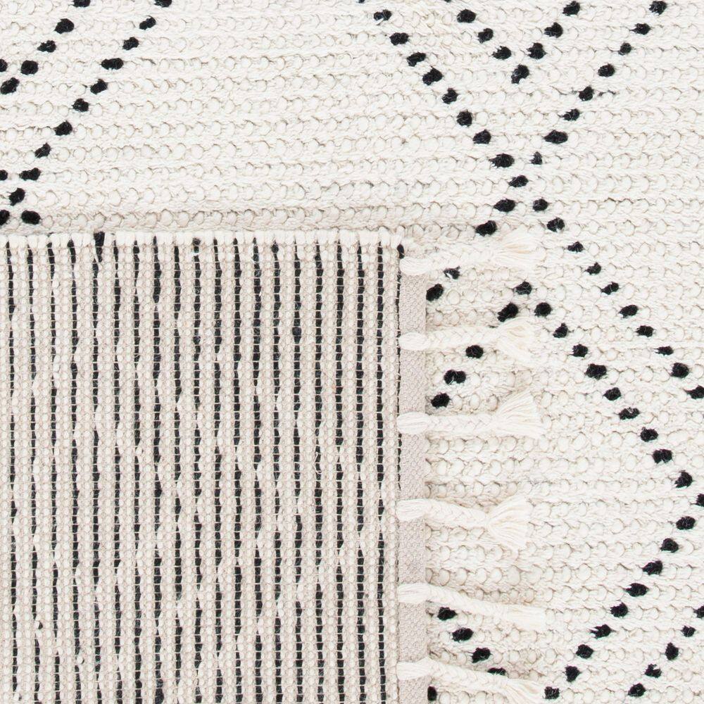 Ivory and Black Hand-Tufted Wool Shag Rug, 4' x 6'