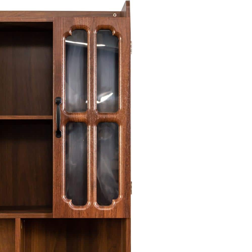 Detail of the glass-fronted cabinet doors on the computer desk