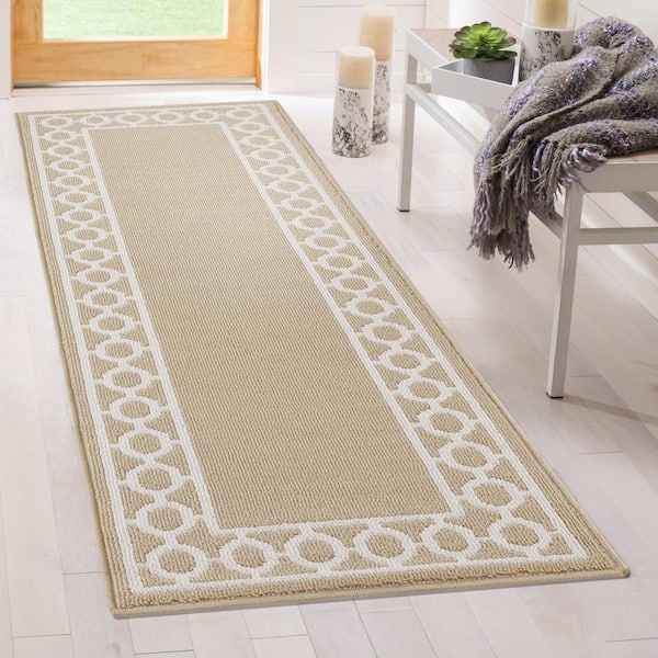 https://images.thdstatic.com/productImages/8ec536a3-4e3d-426e-bb57-687fd8a2c811/svn/beige-and-white-jean-pierre-area-rugs-yma016659-1f_600.jpg