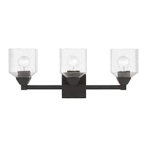 Lansford 23 in. 3-Light Black Vanity Light with Clear Seeded Glass