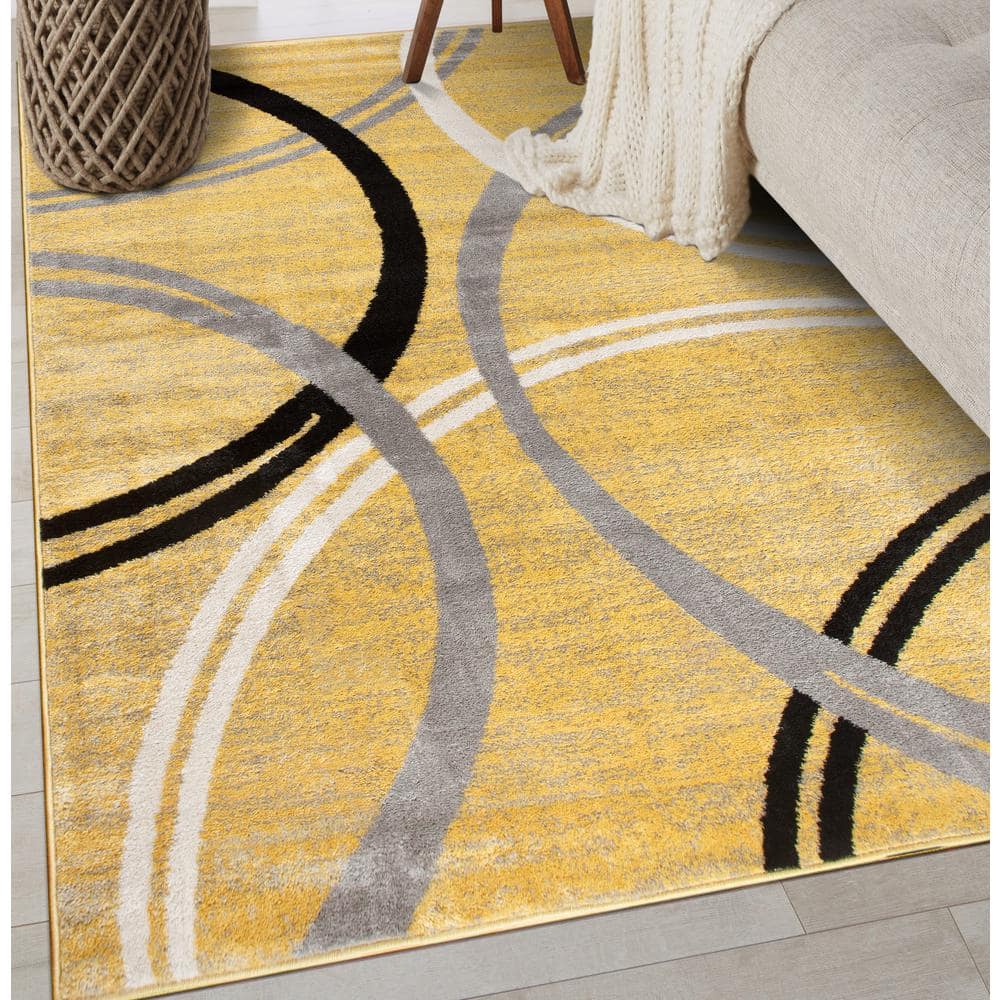 Yellow and Gray Abstract Circles 8' x 10' Synthetic Area Rug