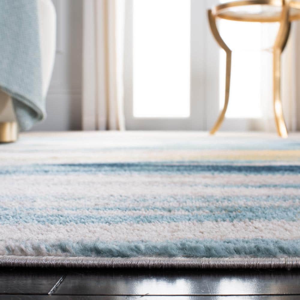 Beige and Navy Abstract Stain-Resistant Synthetic Rug, 4'-5" x 6'-5"