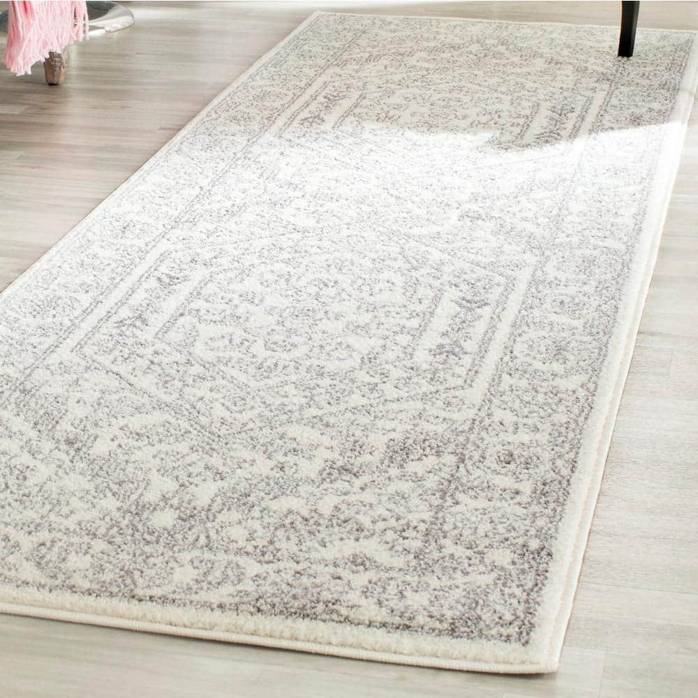 Ivory and Silver Medallion Synthetic Runner Rug