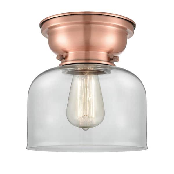 Innovations Bell 8 in. 1-Light Antique Copper Flush Mount with Clear Glass Shade