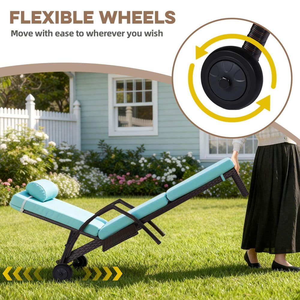 A person moving a blue chaise lounge chair on a lawn.