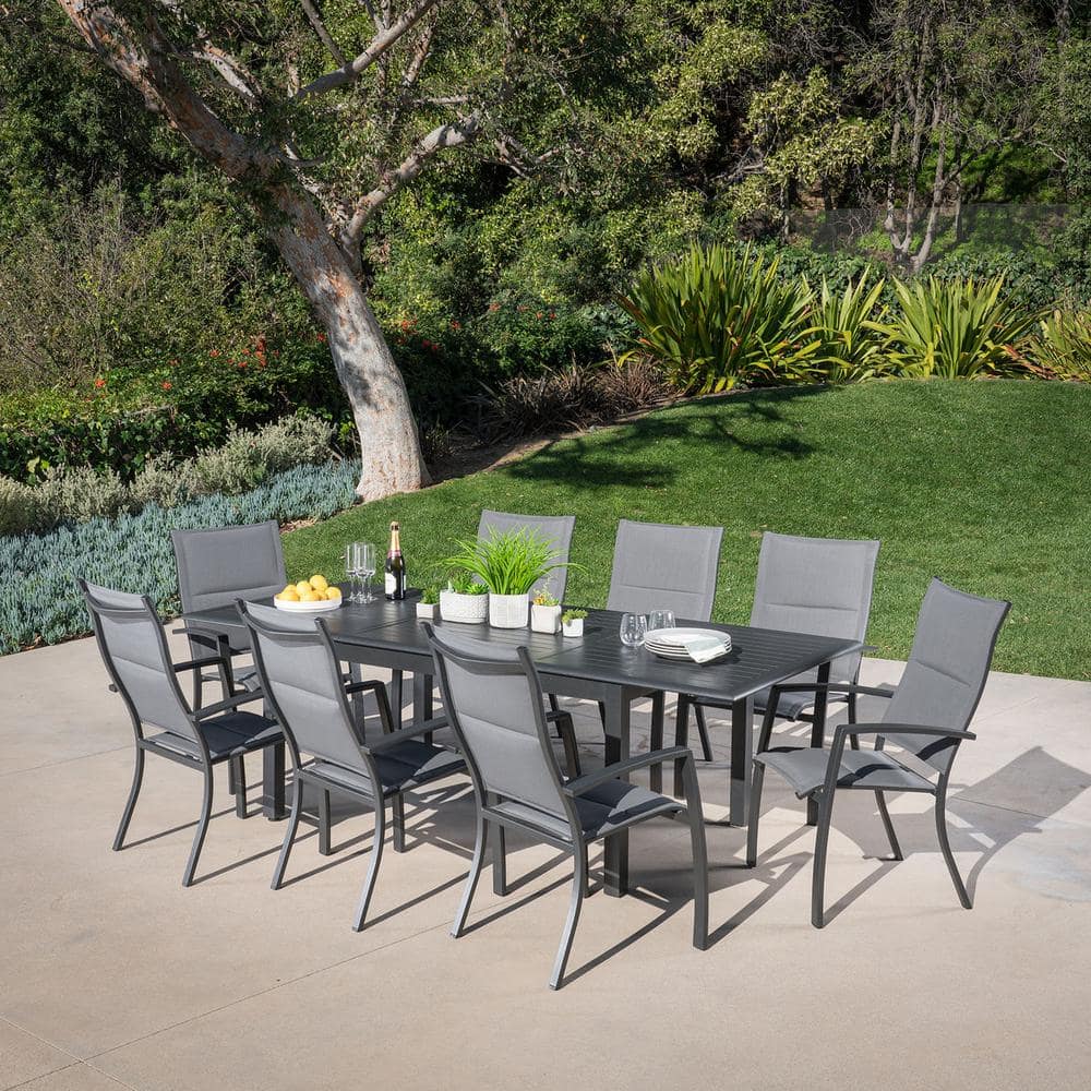 Turner 9-Piece Aluminum Outdoor Dining Set with 8-Padded-Sling Dining Chairs and 40 in. x 94 in. Table price history on PriceWatchPro