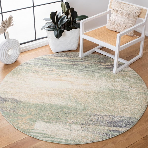 Adirondack Ivory/Sage 5 ft. x 8 ft. Solid Color Distressed Oval Area Rug