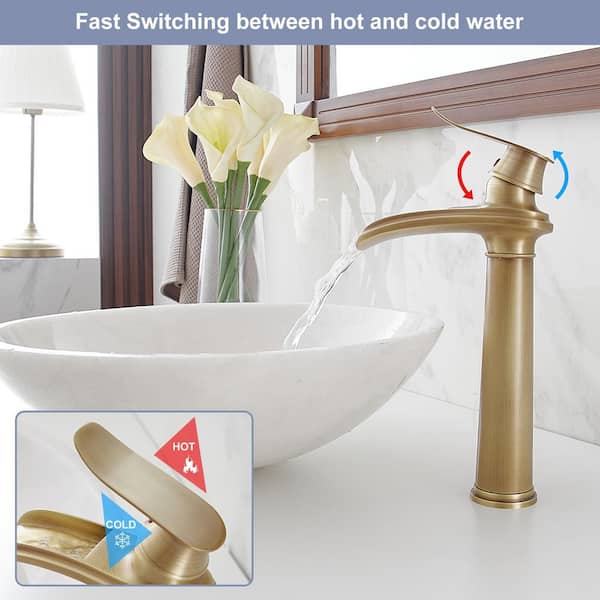 Single Handle Waterfall Vessel Sink Faucet with Drain Kit Included in Antique Brass