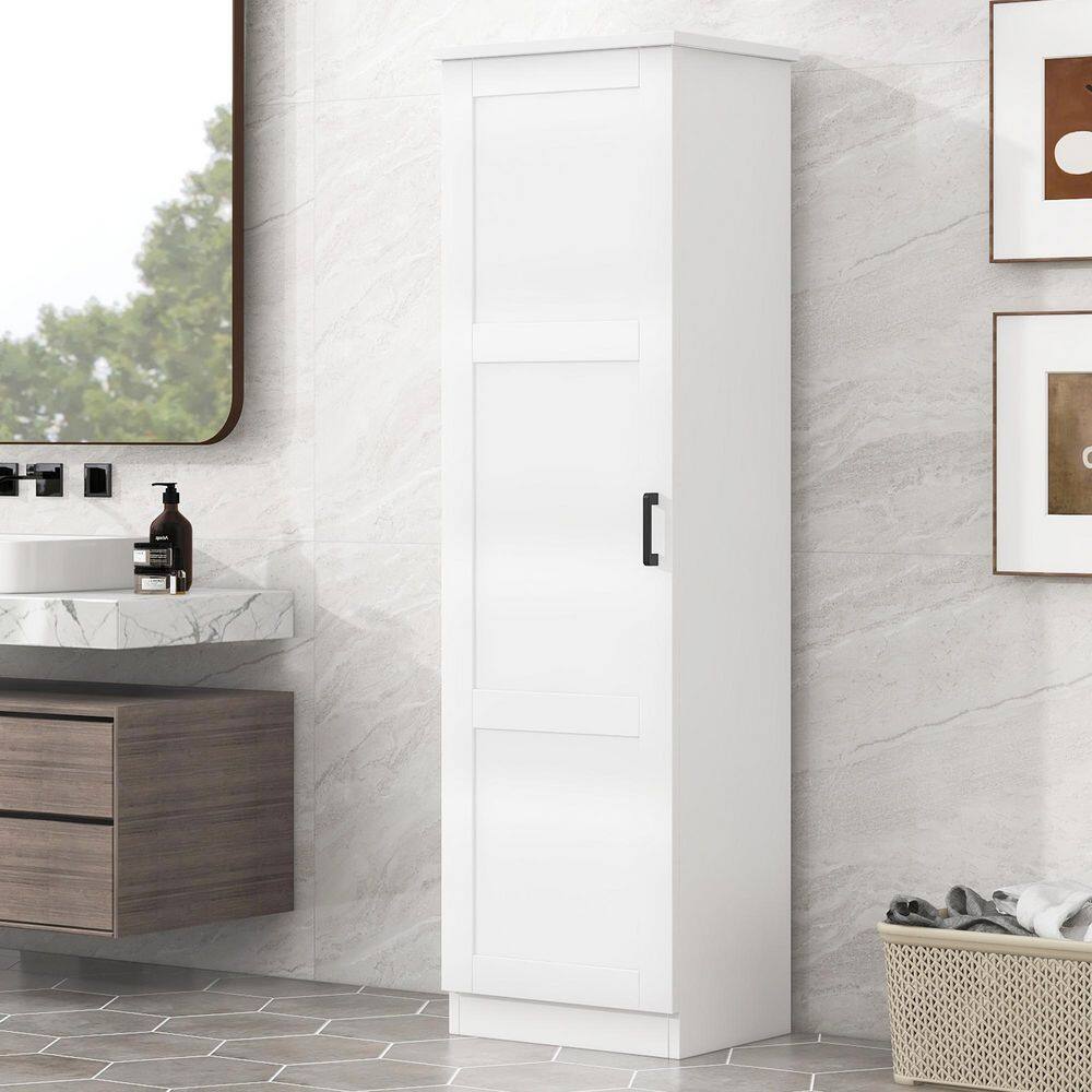 White tall bathroom storage cabinet against a wall.