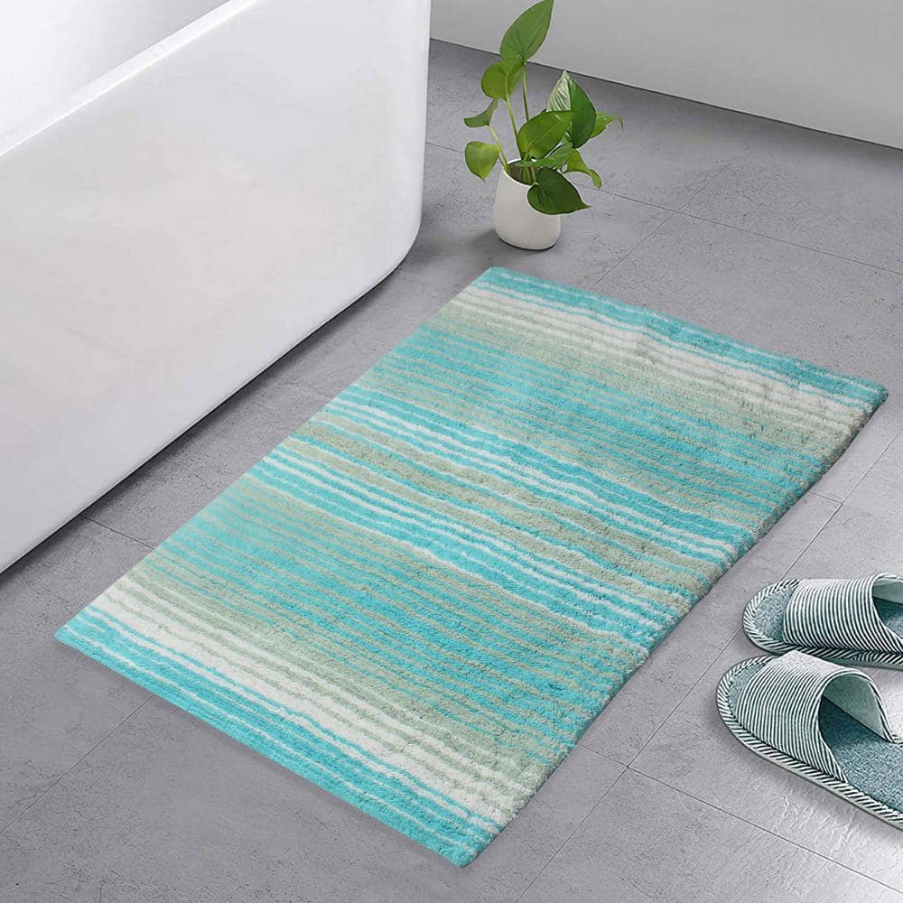 https://images.thdstatic.com/productImages/8f4deab0-9fa2-42e3-9b36-7f36a98129fe/svn/turquoise-bathroom-rugs-bath-mats-bgrd2134tq-64_1000.jpg