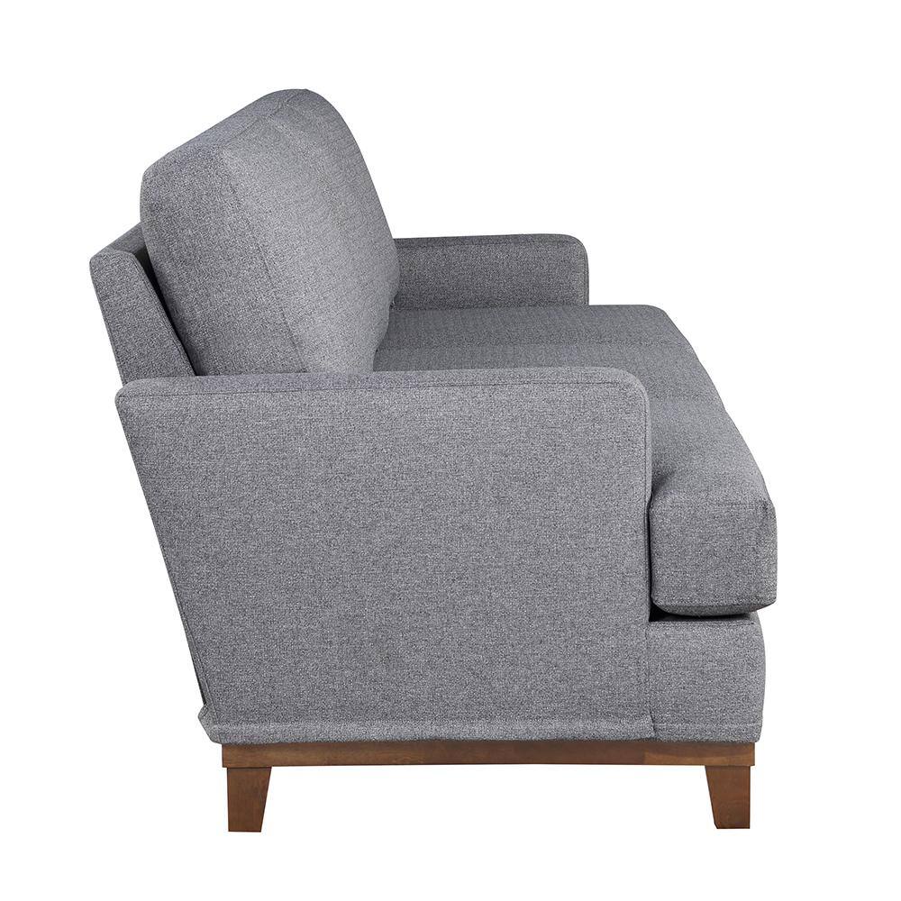 Side profile view of a gray polyester straight sofa.