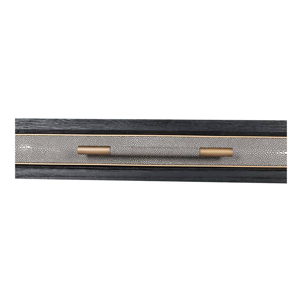 Close-up of a desk drawer front with a metallic accent.
