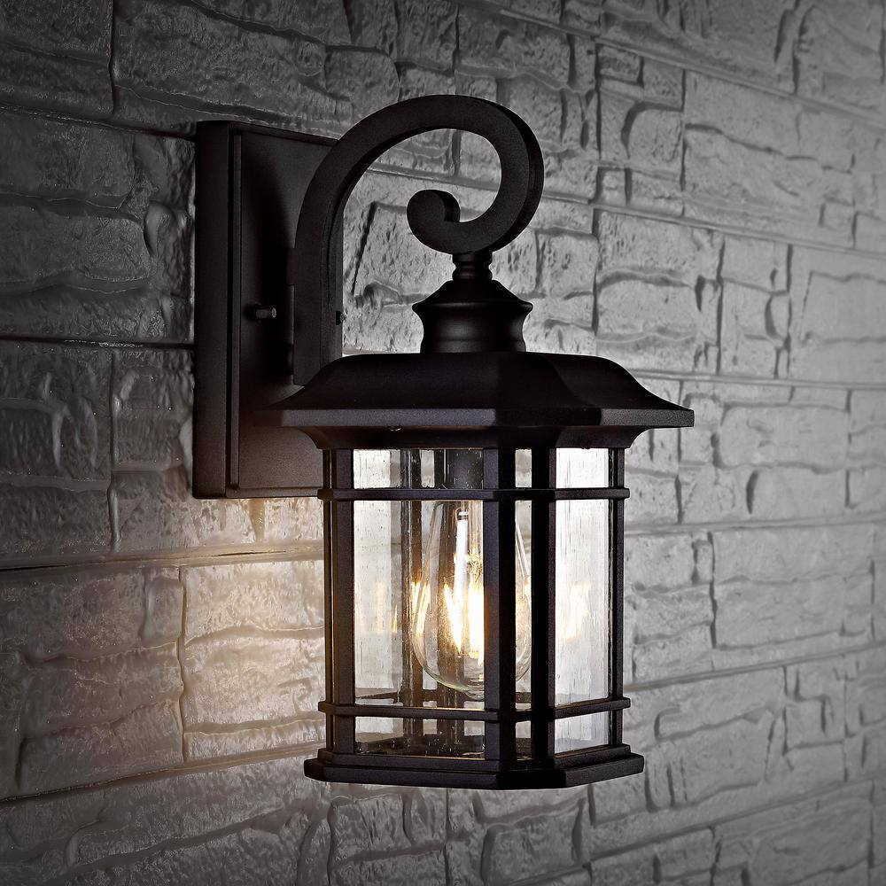 Elegant Black Metal Lantern Wall Sconce with Clear Bubble Glass