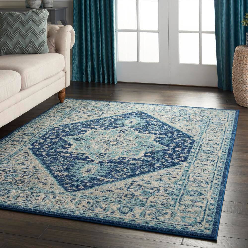 Ivory and Navy Synthetic 5' x 7' Rectangular Area Rug