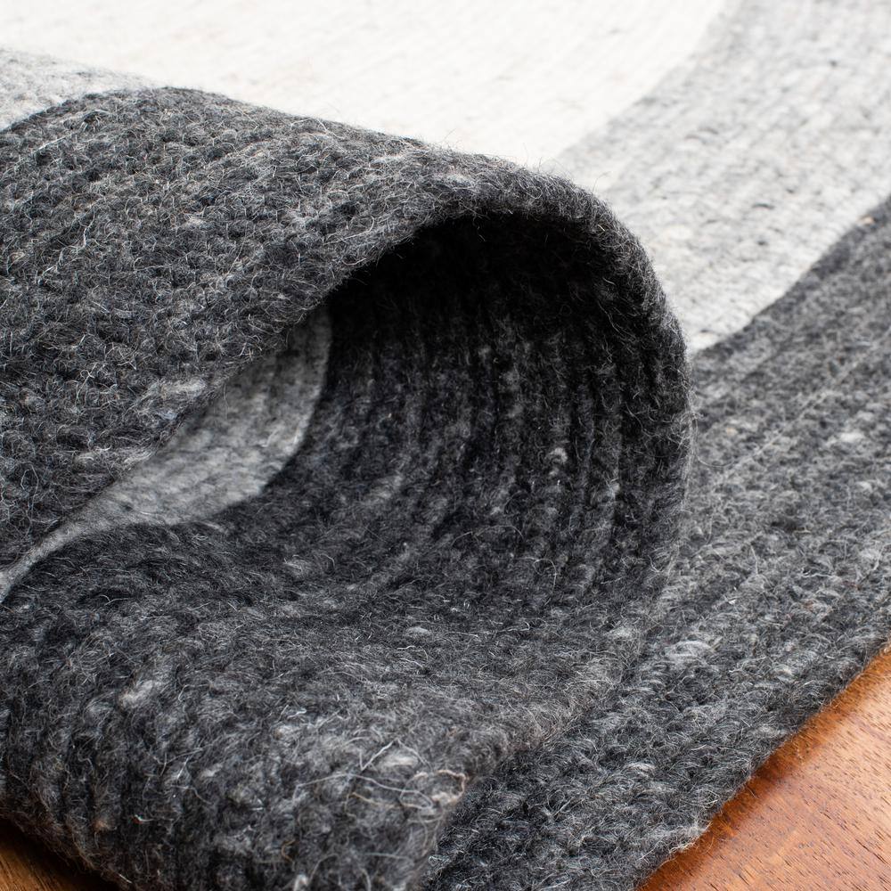 Handmade Grey/Ivory Wool Oval Braided 8' x 10' Area Rug