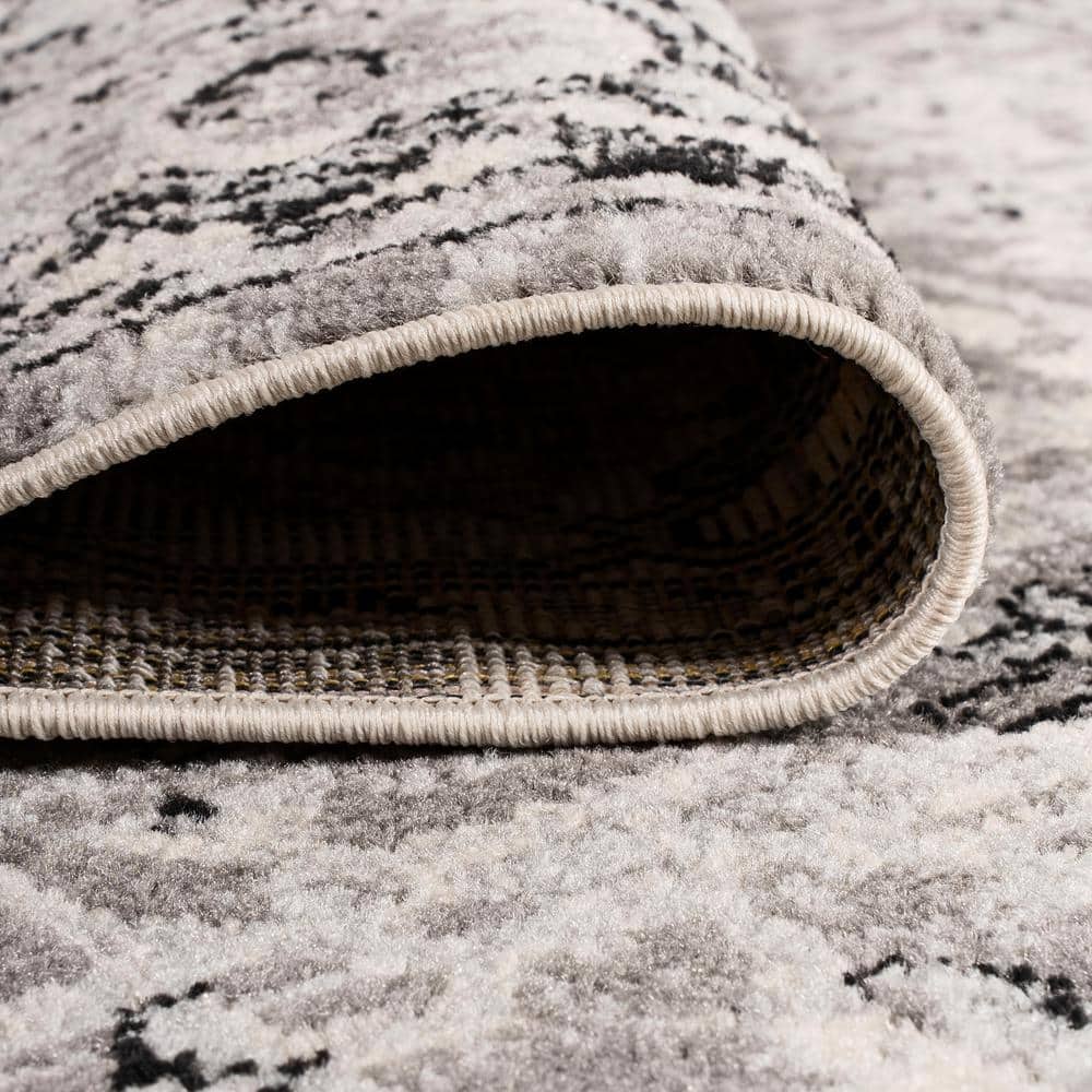 Ivory and Gray Synthetic Medallion 8' x 10' Area Rug