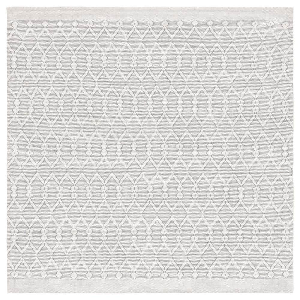Ivory Hand-Tufted Wool and Synthetic Round Area Rug