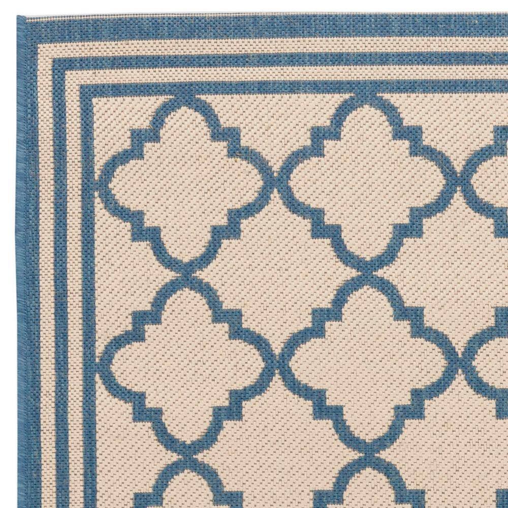 Cream and Blue Geometric Synthetic Indoor/Outdoor Area Rug