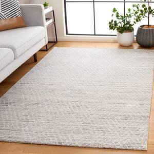 Abstract Silver/Ivory 6 ft. x 9 ft. Chevron Marle Area Rug