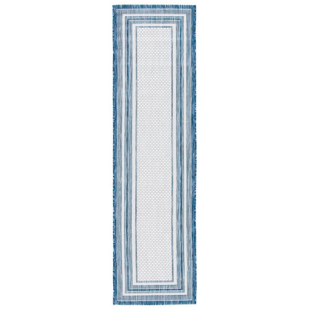 Ivory and Navy Reversible Synthetic Indoor/Outdoor Runner Rug