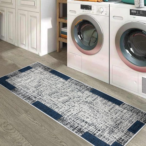 https://images.thdstatic.com/productImages/8faad345-fa9c-49ea-83e1-b54e5c48c1cf/svn/navy-sussexhome-area-rugs-lnr-10a-2x5-c3_600.jpg