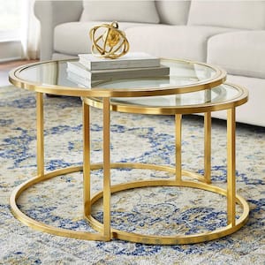 https://images.thdstatic.com/productImages/8fbb38c7-3d88-4406-8128-3a3c8652be71/svn/gold-glass-home-decorators-collection-coffee-tables-dc19-6641-64_300.jpg