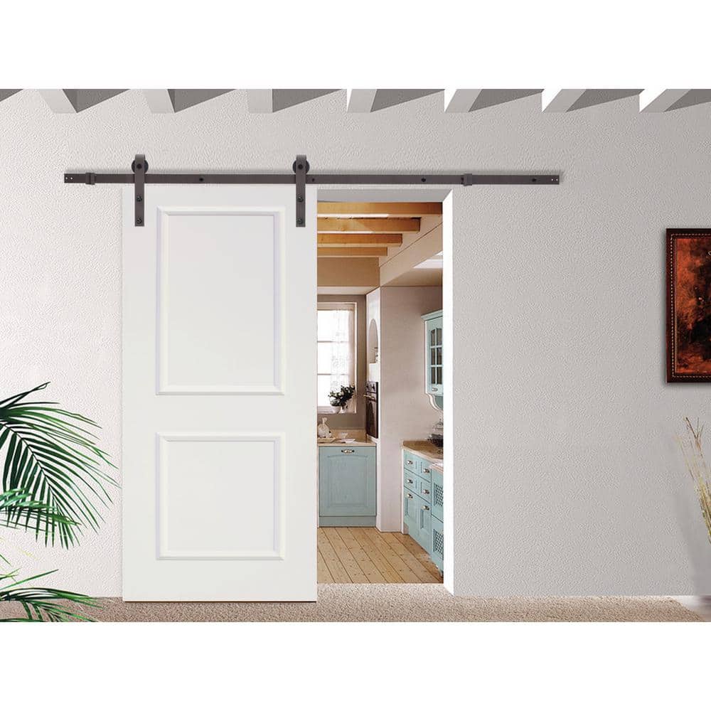 Primed White MDF Raised 2 Panel Sliding Barn Door with Brown Hardware