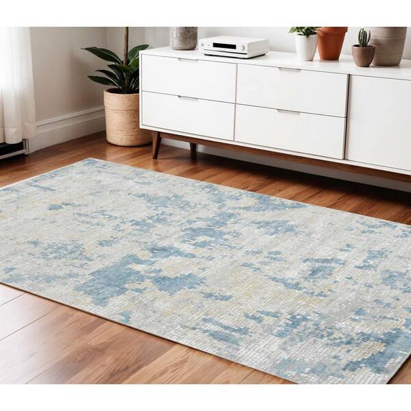 4 ft. x 6 ft. Ivory And Sky Blue Abstract Area Rug