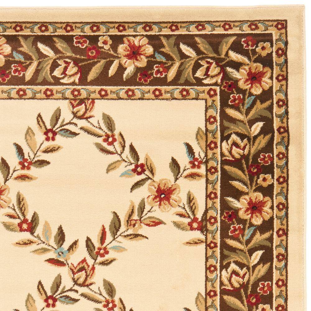 Ivory and Brown Floral Border Medium Pile Area Rug