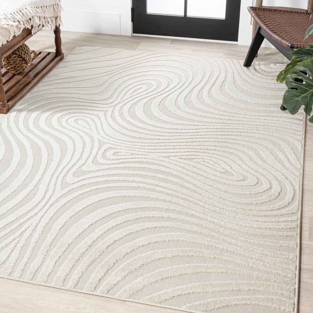 Cream and Ivory 8' x 10' High-Low Striped Synthetic Area Rug